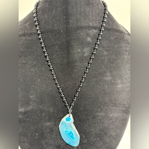 Jewelry - Elegant Blue Stone Pendant and Black Bead Necklace